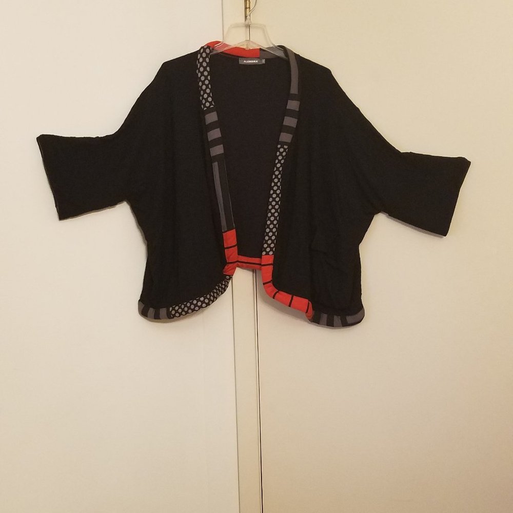 Black Alembika jacket with geometric dimensional red, grey, black trim oversized